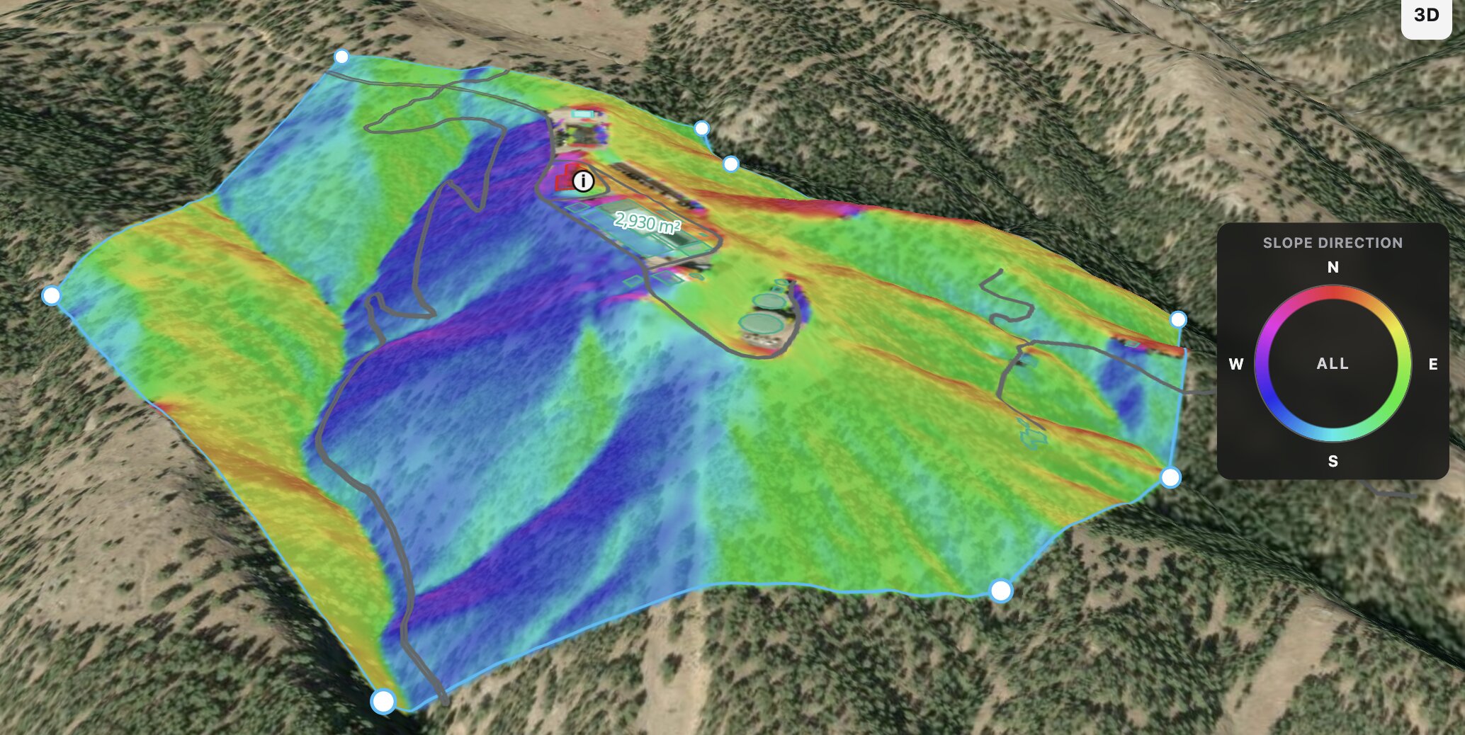 Slope directions across the hillside, shown in rainbow colors with a compass legend.